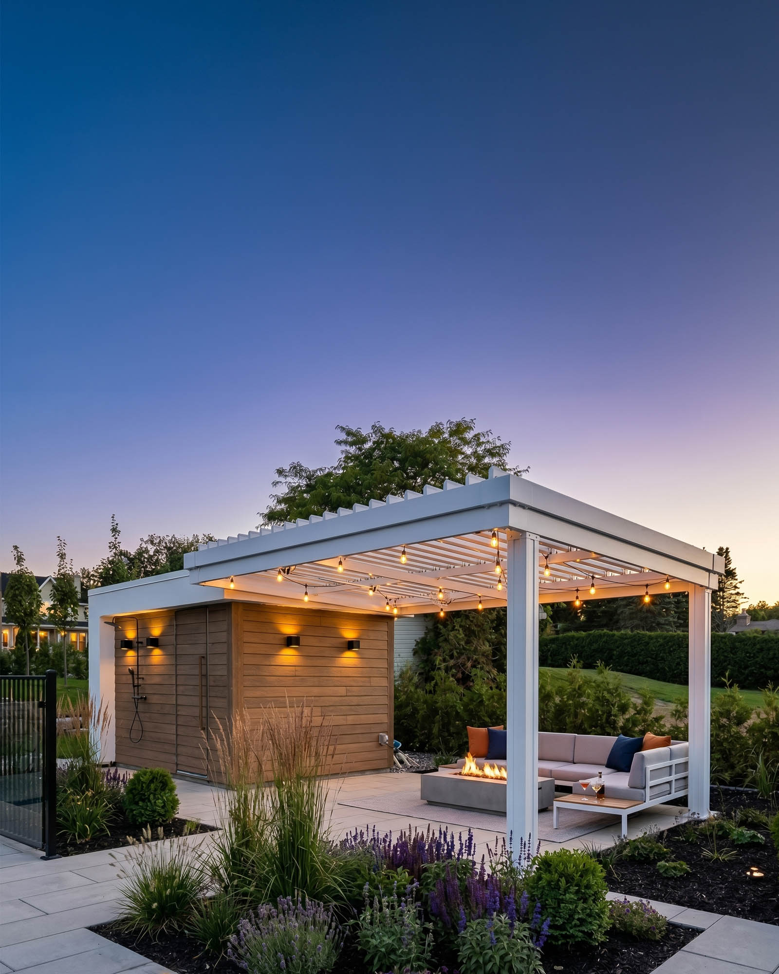 SunLouvre bioclimatic louvered pergola over a Vaughan backyard patio at dusk